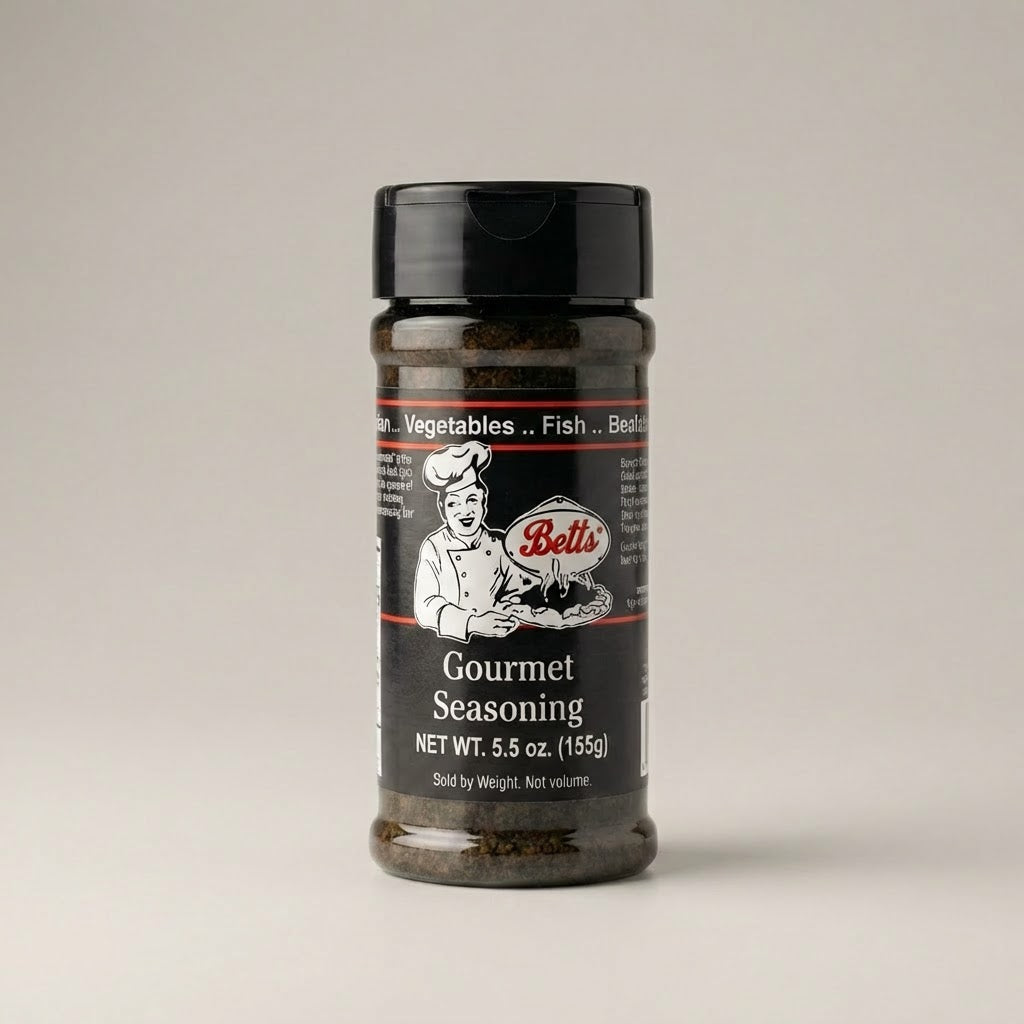 Bottle of Betts Gourmet Seasoning on a light gray background
