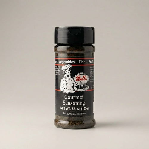 Bottle of Betts Gourmet Seasoning on a light gray background